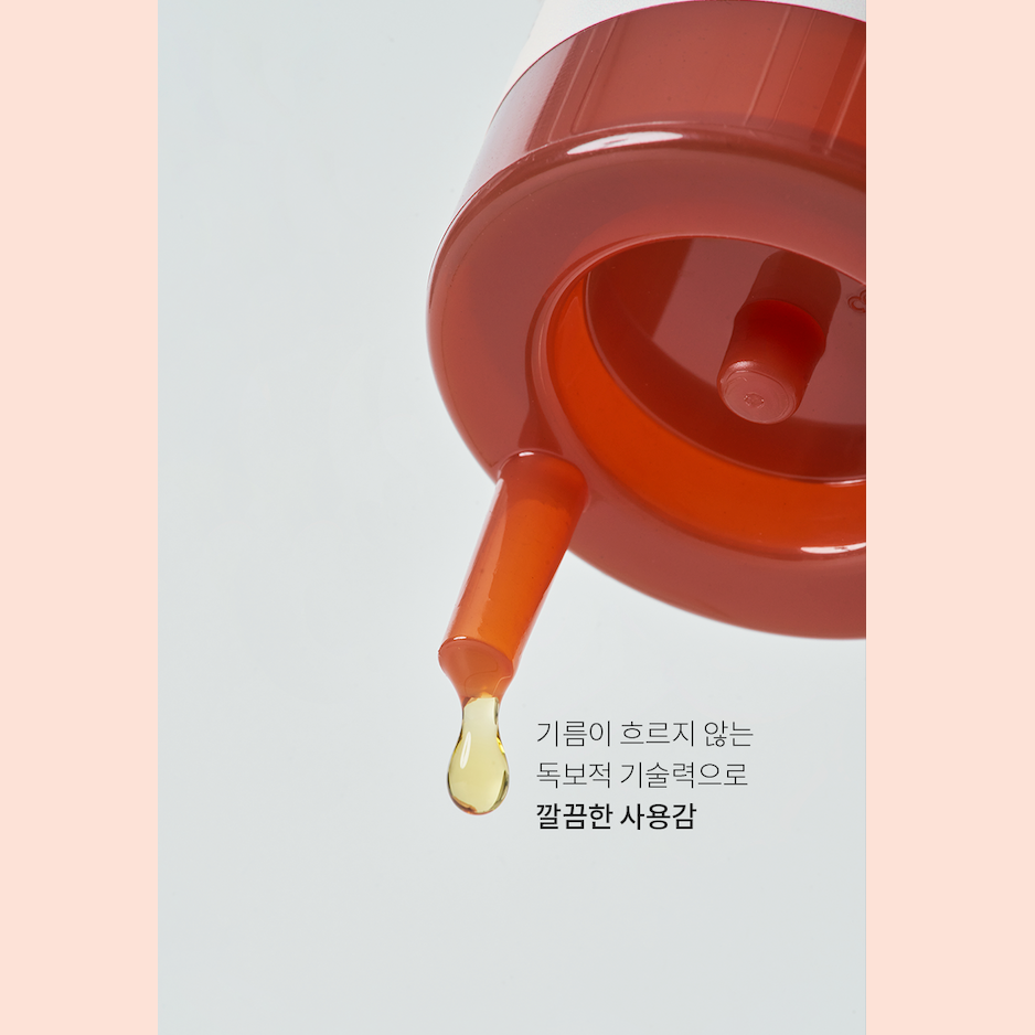 Drop of perilla oil coming out of bottle syringe